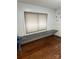 Room with hardwood floors and a built-in workspace at 3238 Campbell Dr, Charlotte, NC 28205