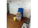 Room with hardwood floors, and various items stored at 3238 Campbell Dr, Charlotte, NC 28205