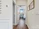 Hallway with view into bedroom and hardwood floors at 328 Sunharvest Ln, Indian Trail, NC 28079