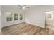 Bedroom with en-suite bathroom and hardwood floors at 9247 Eleanor Dr, Charlotte, NC 28214