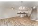 Open concept kitchen with island and stainless steel appliances at 9247 Eleanor Dr, Charlotte, NC 28214