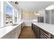 Modern kitchen with an island and stainless steel appliances at 4107 Closeburn Townes Ct, Charlotte, NC 28210