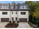 Modern white townhome with two-car garage at 4107 Closeburn Townes Ct, Charlotte, NC 28210