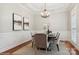 Well-lit dining room featuring hardwood floors and a chandelier at 428 Presidio Dr, Rock Hill, SC 29732