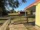 Wooden deck with bench overlooking backyard at 16409 Silver Rd, Oakboro, NC 28129