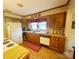 A well-lit kitchen with wood cabinets and modern appliances at 16409 Silver Rd, Oakboro, NC 28129