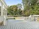 Spacious deck with backyard access and wooded views at 2916 Redfield Dr, Charlotte, NC 28270