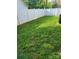 Large grassy backyard with a white privacy fence at 1025 Old Charlotte Rd, Statesville, NC 28677