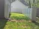 Side yard with grassy area and privacy fence at 1025 Old Charlotte Rd, Statesville, NC 28677