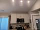 Kitchen with white cabinets and stainless steel appliances at 1025 Old Charlotte Rd, Statesville, NC 28677