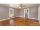 Living room with hardwood floors and view to kitchen at 127 E Branch Ave, Shelby, NC 28152