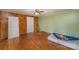Simple bedroom with wood walls and flooring at 127 E Branch Ave, Shelby, NC 28152
