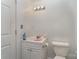 Simple bathroom with a sink and toilet at 127 E Branch Ave, Shelby, NC 28152
