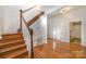 Wooden staircase with white railing and hardwood floors at 127 E Branch Ave, Shelby, NC 28152