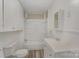 Clean bathroom with tub shower, vanity, and flooring at 127 E Branch Ave, Shelby, NC 28152