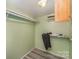 Spacious closet with wood shelving and hanging rod at 127 E Branch Ave, Shelby, NC 28152