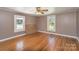 Hardwood floor bedroom with two windows at 127 E Branch Ave, Shelby, NC 28152