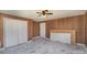 Bedroom with wood paneled walls and double closet at 127 E Branch Ave, Shelby, NC 28152