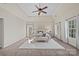 Main bedroom with carpeted floors and ceiling fan at 9440 Wallace Pond Dr, Huntersville, NC 28078