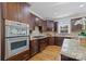 Kitchen features stainless steel appliances and ample cabinetry at 9440 Wallace Pond Dr, Huntersville, NC 28078