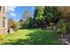Landscaped backyard with lush greenery at 9440 Wallace Pond Dr, Huntersville, NC 28078