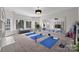 Bright home gym with plenty of space for exercise at 9440 Wallace Pond Dr, Huntersville, NC 28078