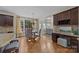 Bright breakfast nook with view into Gathering room at 9440 Wallace Pond Dr, Huntersville, NC 28078