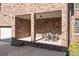 Brick patio with seating area near garage at 9440 Wallace Pond Dr, Huntersville, NC 28078