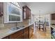 Kitchen with granite countertops, stainless steel appliances, and island at 9440 Wallace Pond Dr, Huntersville, NC 28078
