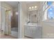 Simple bathroom with single vanity and tub at 9440 Wallace Pond Dr, Huntersville, NC 28078