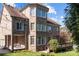 Brick home with deck and landscaped yard at 9440 Wallace Pond Dr, Huntersville, NC 28078
