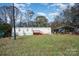 Mobile home exterior with carport and yard at 334 Tirzah Church Rd, Lancaster, SC 29720