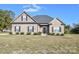 Brick ranch home with a gray roof and landscaping at 3318 Sincerity Rd # 7, Monroe, NC 28110