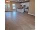 Open concept kitchen with white cabinets and granite countertops at 420 Godwin St, Marshville, NC 28103