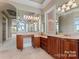 Elegant bathroom with double vanity, large soaking tub, and walk-in shower at 590 Tuckertown Rd, New London, NC 28127
