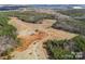 Aerial view of the property's extensive acreage and unique driveway at 590 Tuckertown Rd, New London, NC 28127