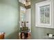 Elegant bathroom with double vanity and a window at 590 Tuckertown Rd, New London, NC 28127