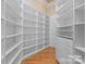 Large walk-in pantry with custom shelving, providing ample storage at 590 Tuckertown Rd, New London, NC 28127