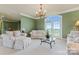 Spacious sitting room with French doors opening to a balcony at 590 Tuckertown Rd, New London, NC 28127