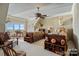 Charming bedroom with two twin beds, scenic window views, and rustic decor at 590 Tuckertown Rd, New London, NC 28127