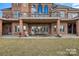 Large brick patio with access from multiple doors at 590 Tuckertown Rd, New London, NC 28127