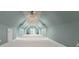 Expansive bonus room with high ceilings and multiple windows at 590 Tuckertown Rd, New London, NC 28127