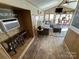 Open living area with kitchen and seating at 104 Cardinal Ave, New London, NC 28127