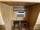Window air conditioning unit and two stools at 104 Cardinal Ave, New London, NC 28127