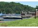 Image of Badin Shores Marina with a boat and lake in the background at 104 Cardinal Ave, New London, NC 28127