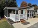 Mobile home with screened porch and deck at 104 Cardinal Ave, New London, NC 28127