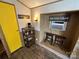 Small coffee bar with shelves and a mini-fridge at 104 Cardinal Ave, New London, NC 28127