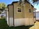 Tan colored home exterior with a partially visible deck at 104 Cardinal Ave, New London, NC 28127