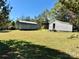 Spacious backyard with detached workshop and shed at 111 Little River Church Rd, Taylorsville, NC 28681