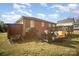 Large backyard with storage shed and landscaping at 131 E Branch Ave, Shelby, NC 28152